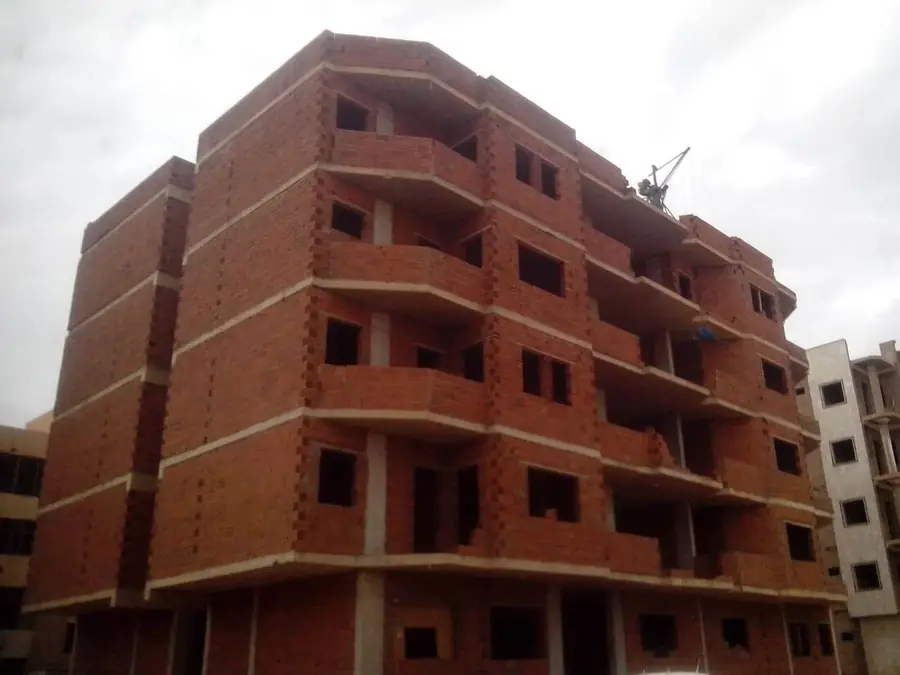 Completed frame & red-block masonry