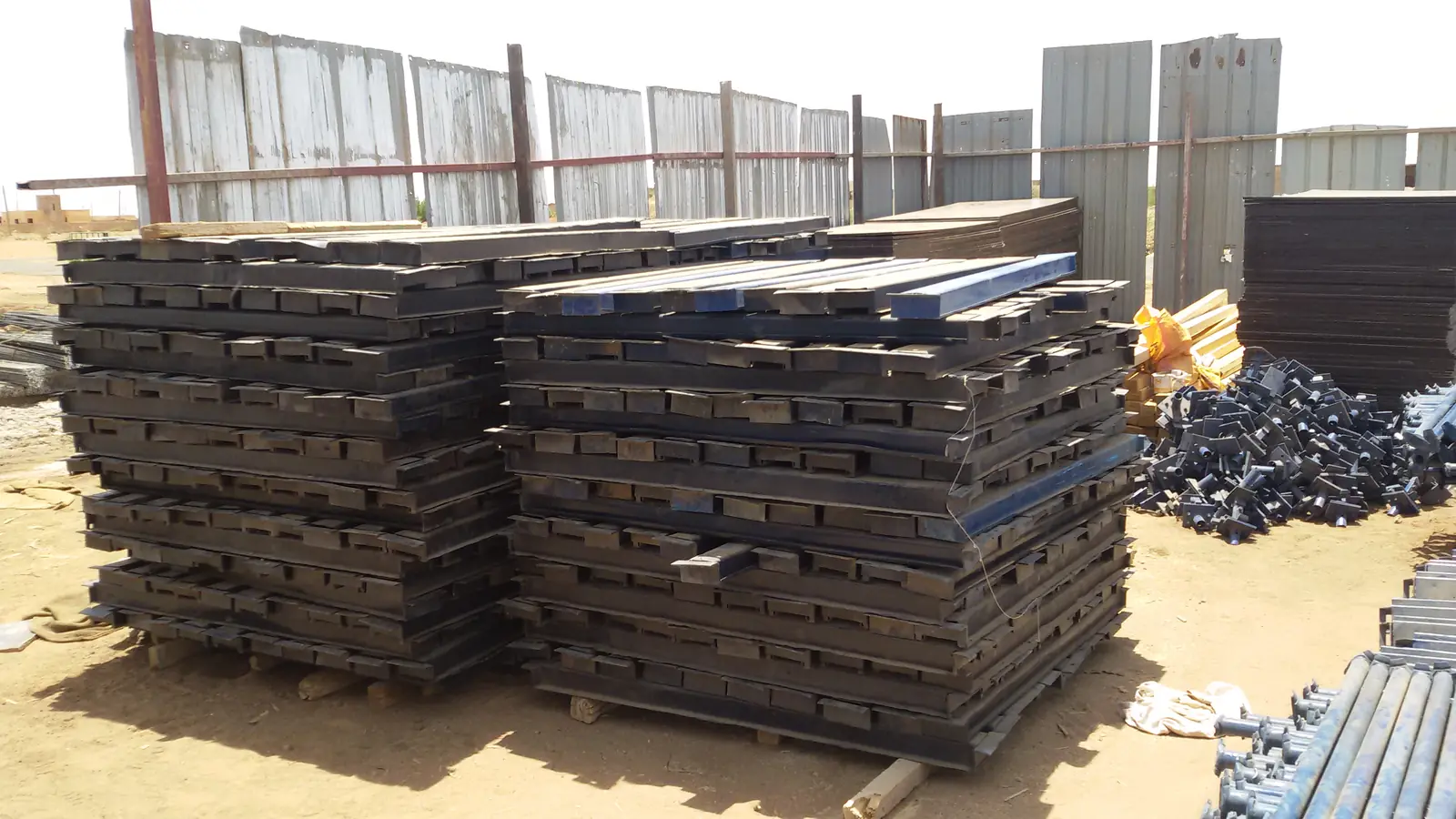 Steel wall and slab formwork panels with clamps and wedges